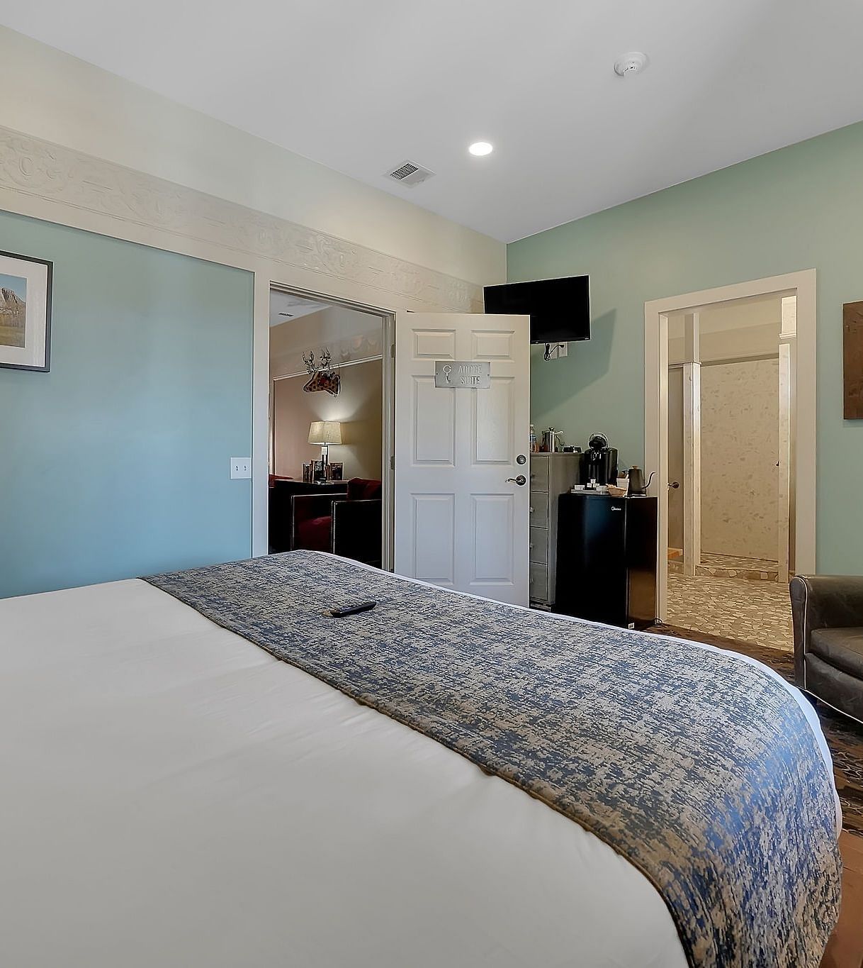 A view of a room at The Groveland Hotel with a double bed.