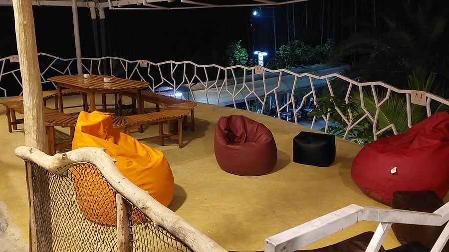 Relaxing outdoor space with comfortable seating options under the night sky -  Matsya Island Retreat by Island Quest.