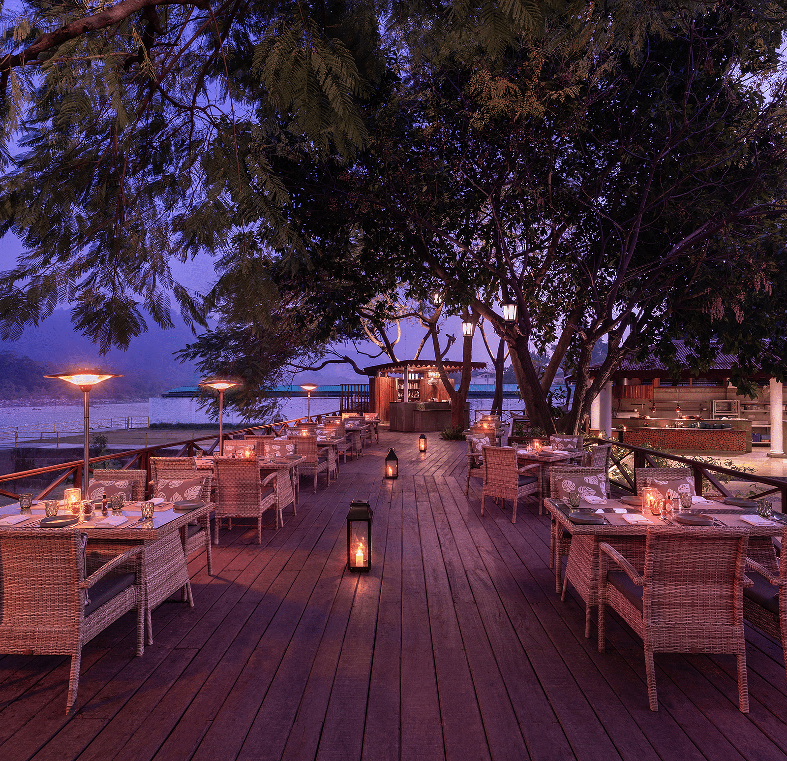 An image of an outdoor dining area beside a lake - The Riverview Retreat,  Corbett