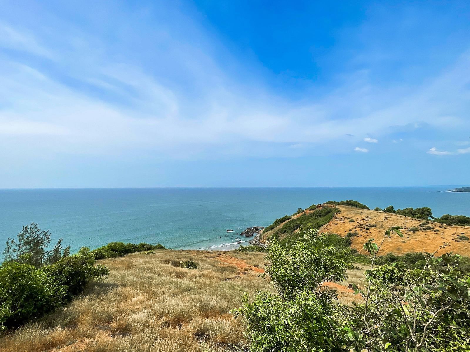 a view from Chapora Fort of the arabian sea with blue sky in the background