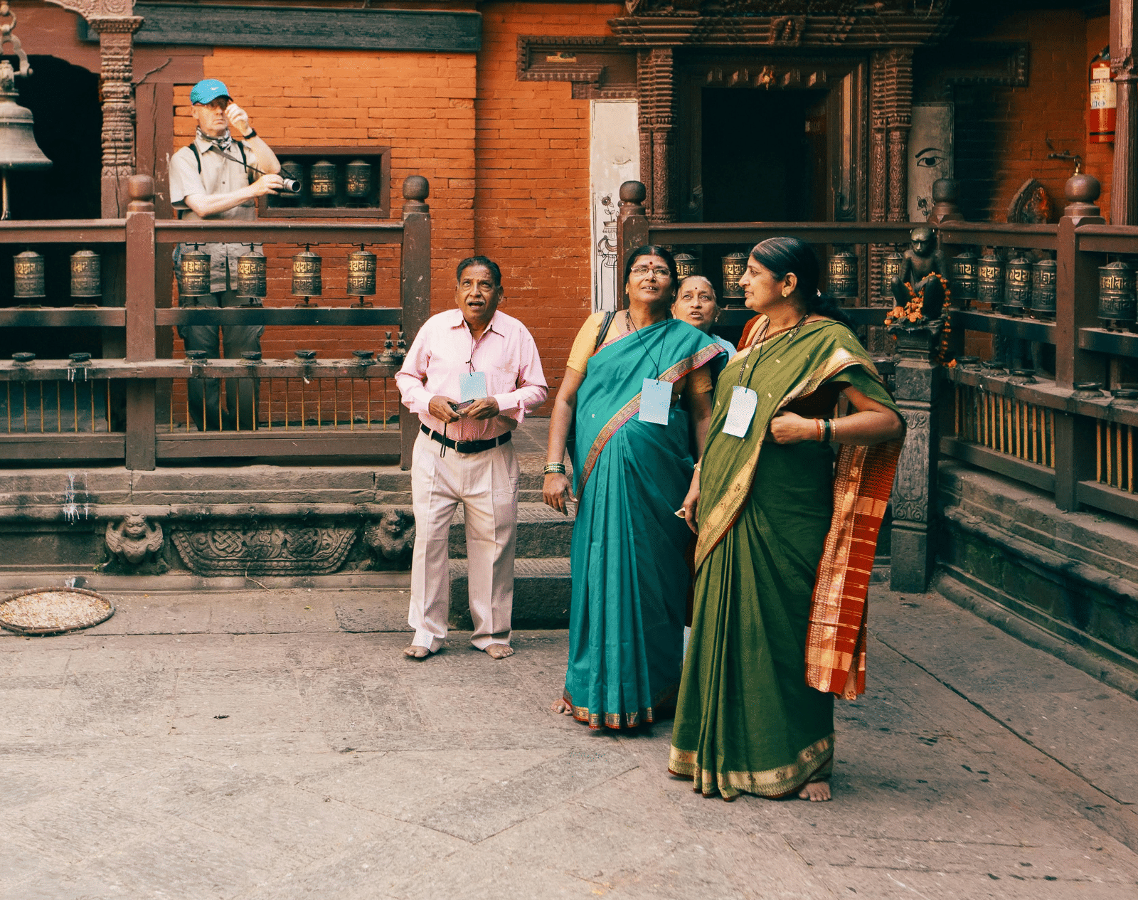 A group of tourists exploring a temple.
