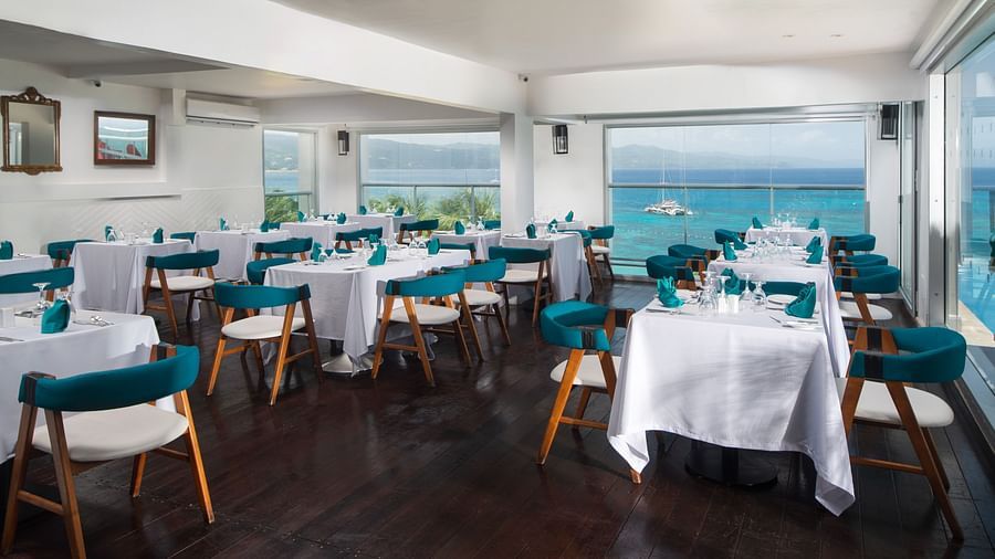 An image of a restaurant in Jamaica offering views of a crystal clear sea  - S Hotel Montego Bay, Jamaica