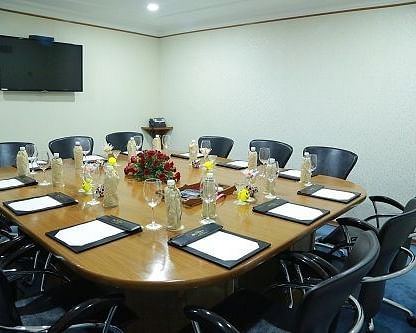 Seating arrangement inside the boardroom at Hotel Clarks Shiraz, Agra