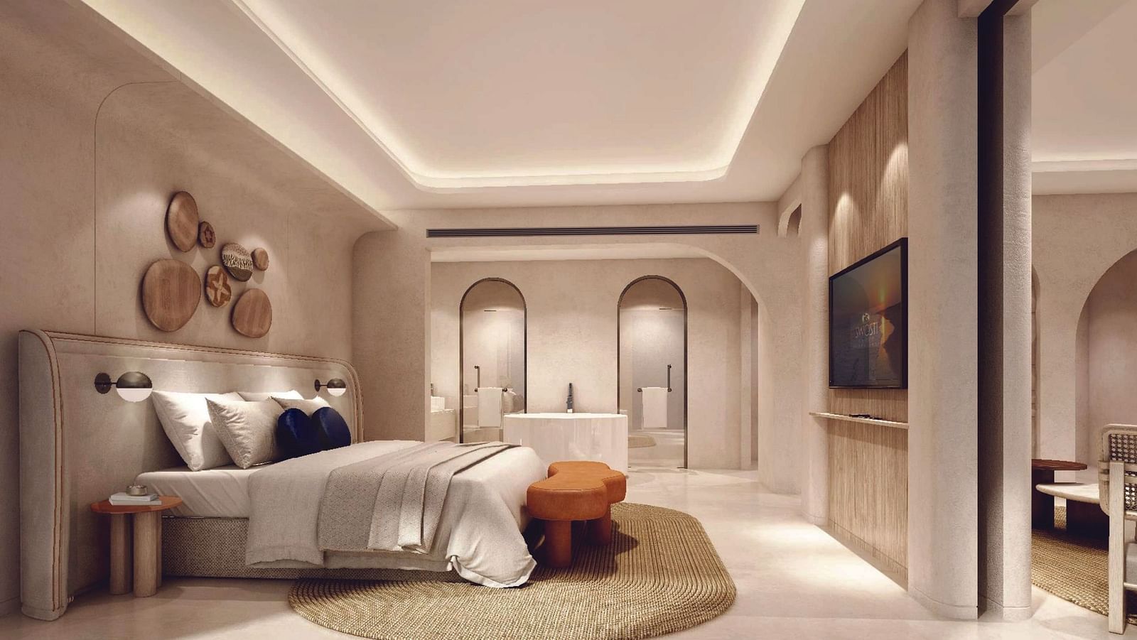 A hotel room with a double bed and white ambience