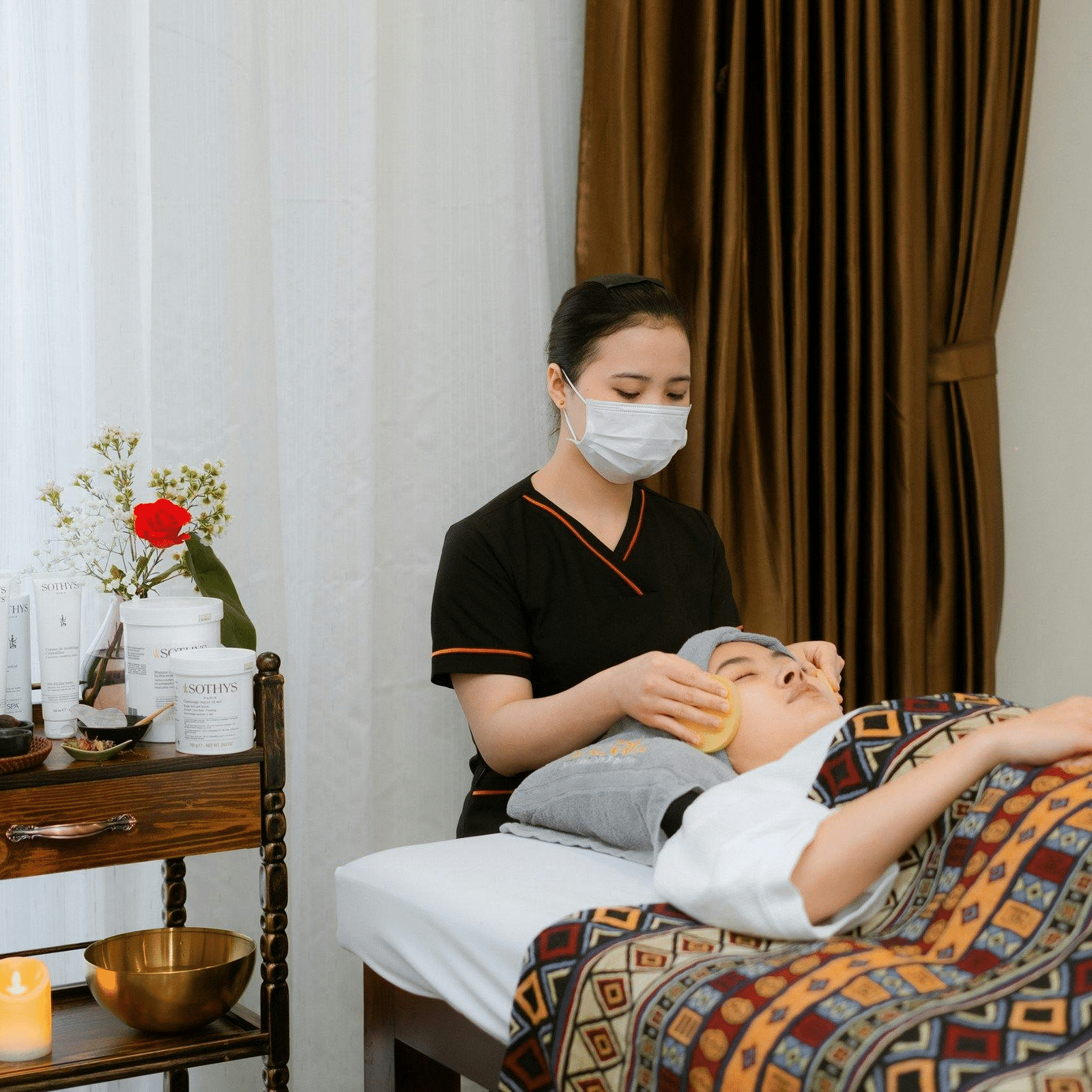 A person is getting massage in spa.