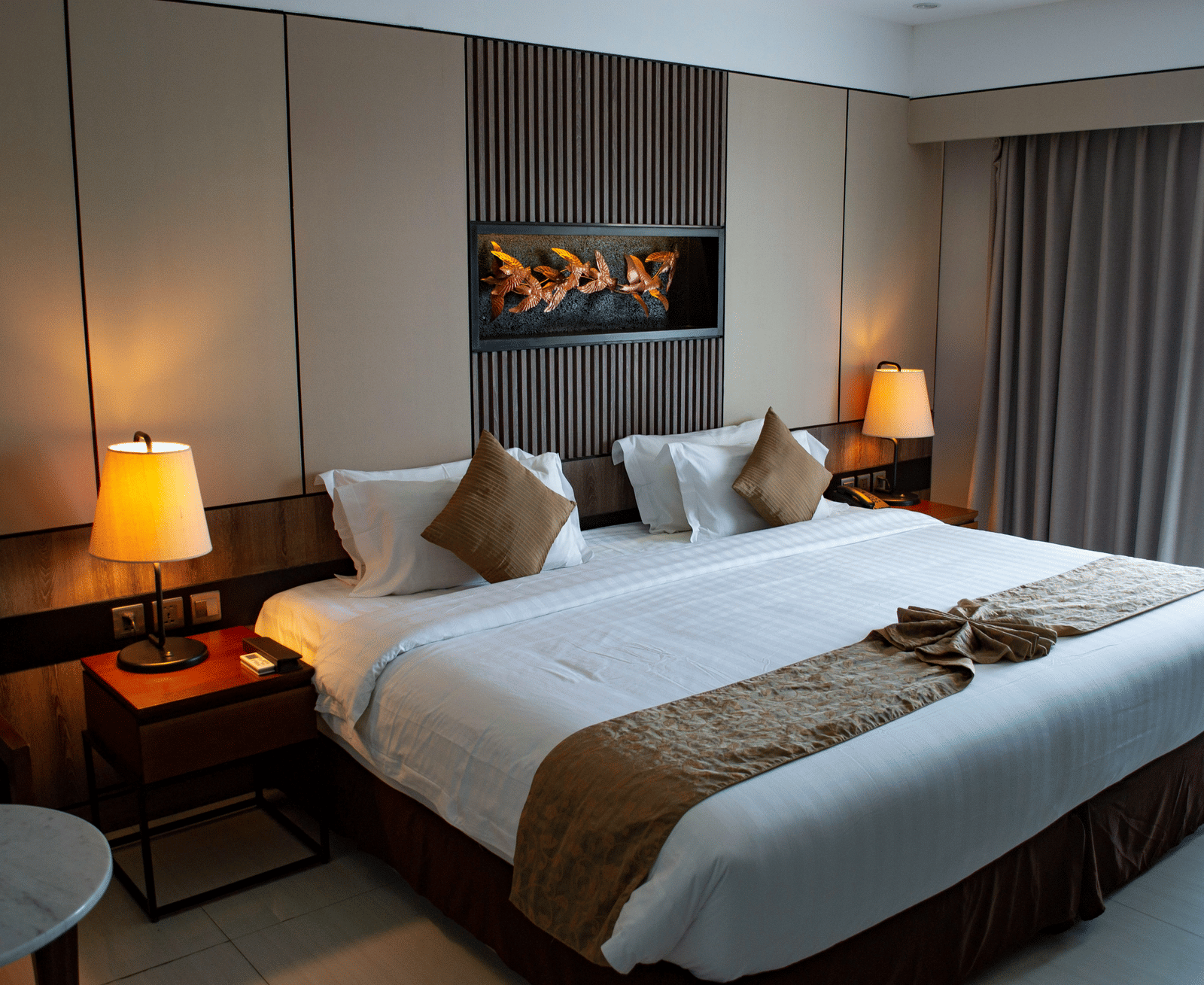 Spacious family room with two beds and elegant decor