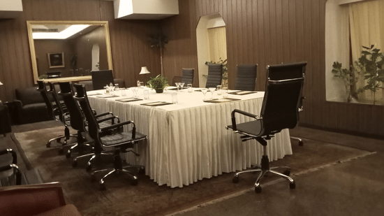 the sitting area at a boardroom | Clarks Hotel