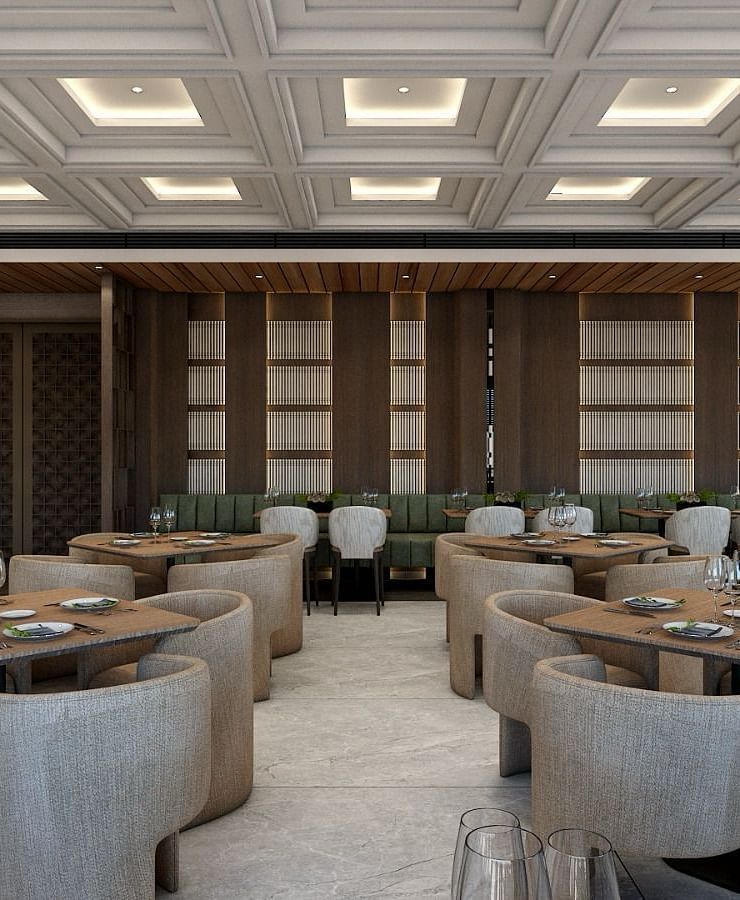 Full view image of the restaurant with featuring an expansive area with grey coloured chairs set around the table - Namaste Corbett