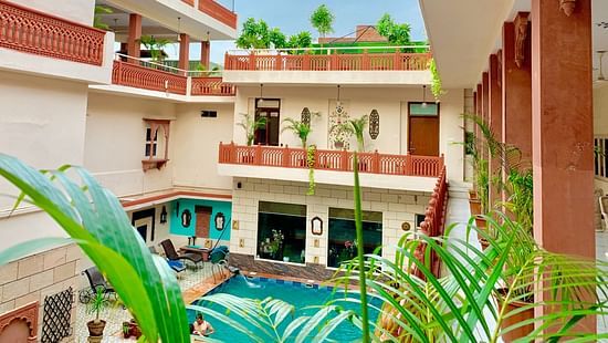 Interior image with pool in the centre at hotel Suryaa Villa Jaipur