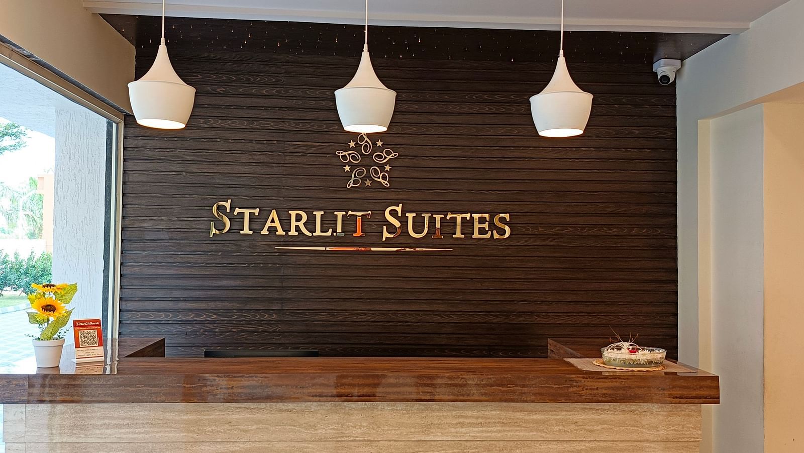a close up shot of the Reception - Starlit Suites, Shirdi