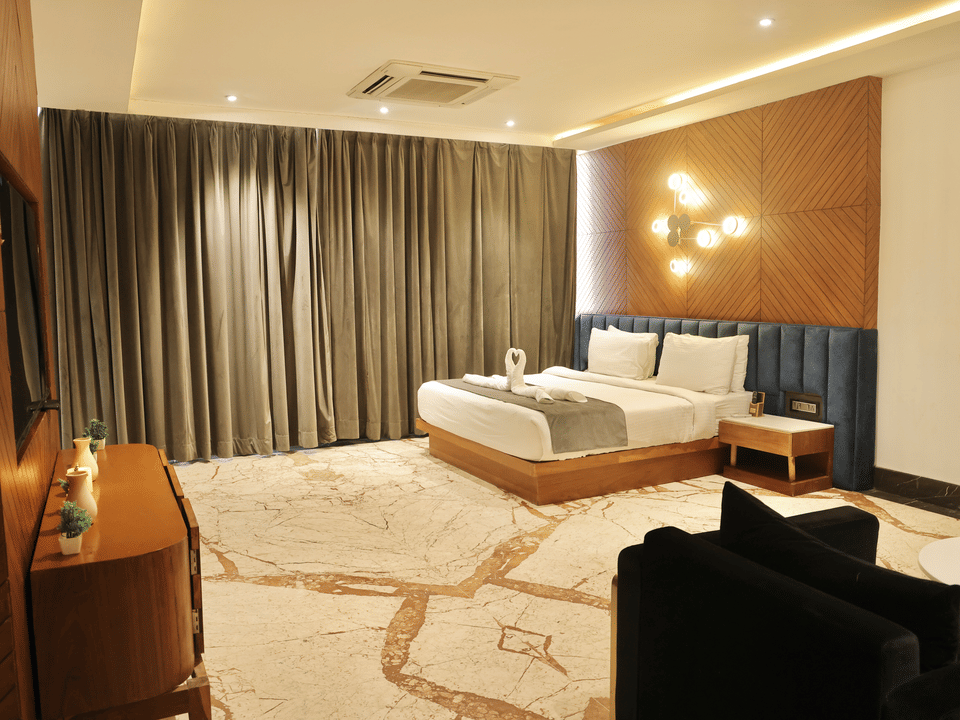 Skyline by Miraya, Venus Family Room, Bedroom with lounge sofa on marble floor