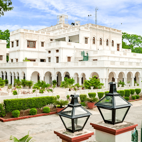 Facade with small shrubs on the compound - The Baradari Palace