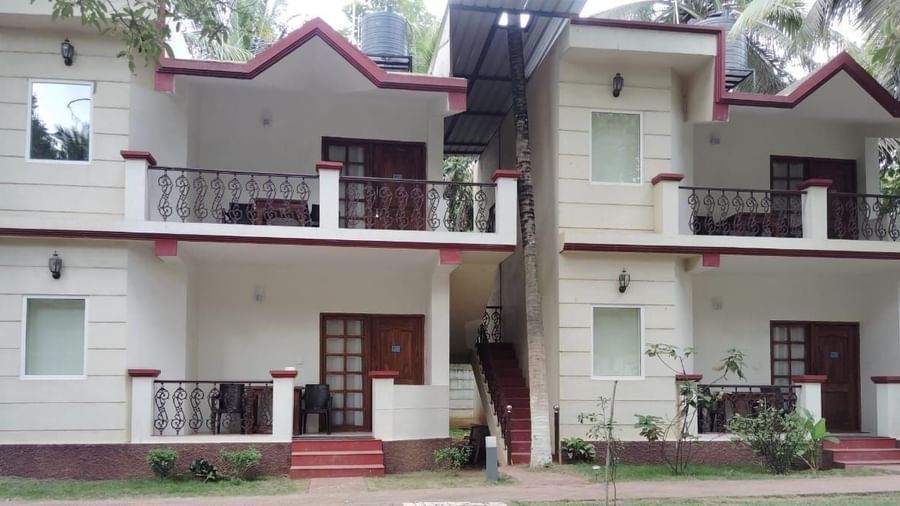 Multi-storey building with balconies and landscaped surroundings at Fantasy Golf Resort.