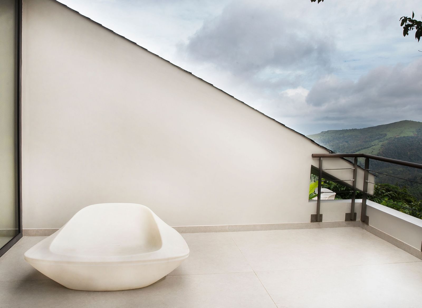 A terrace with stunning views of a mountain range in the background at Stanley Revelation.