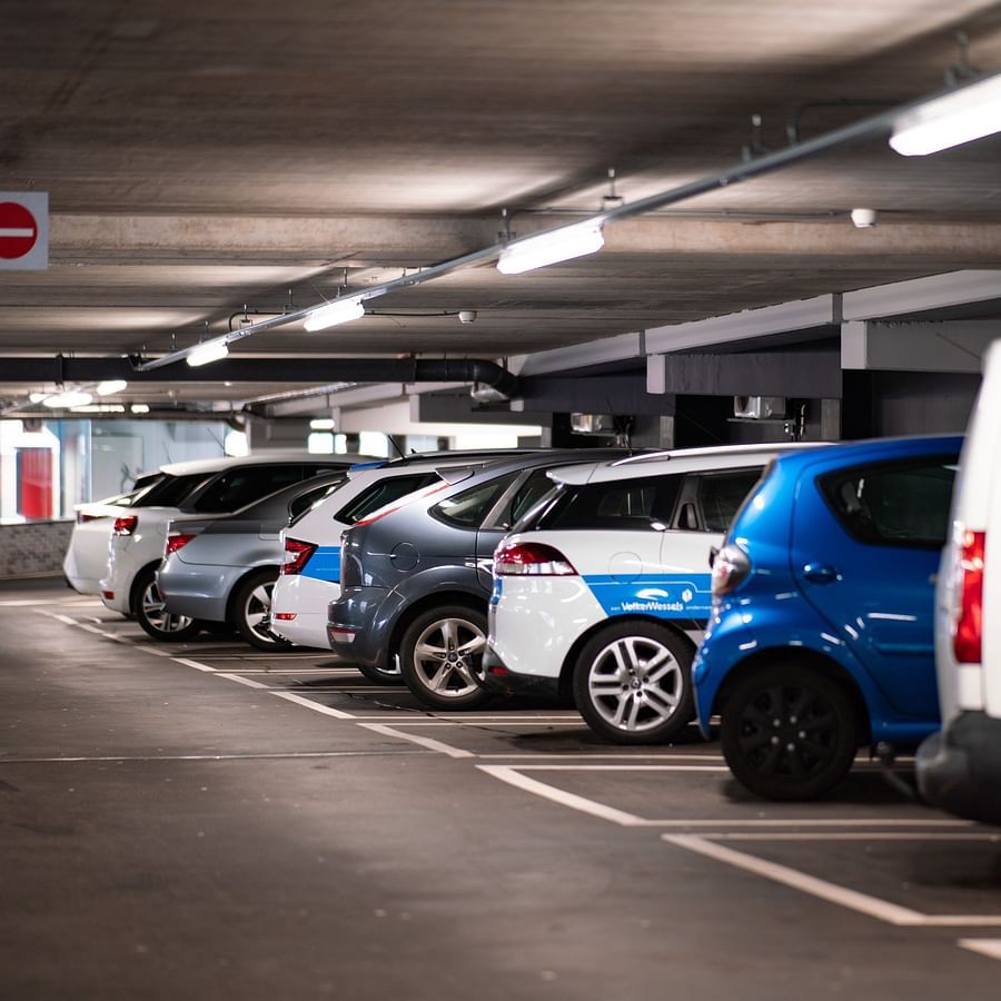 a parking lot with several cars
