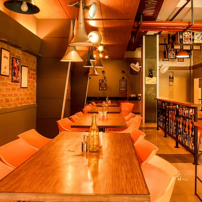 Max Hotel Prayagraj Allahabad Seating arrangement inside mumbai masala restaurant - Max Hotel