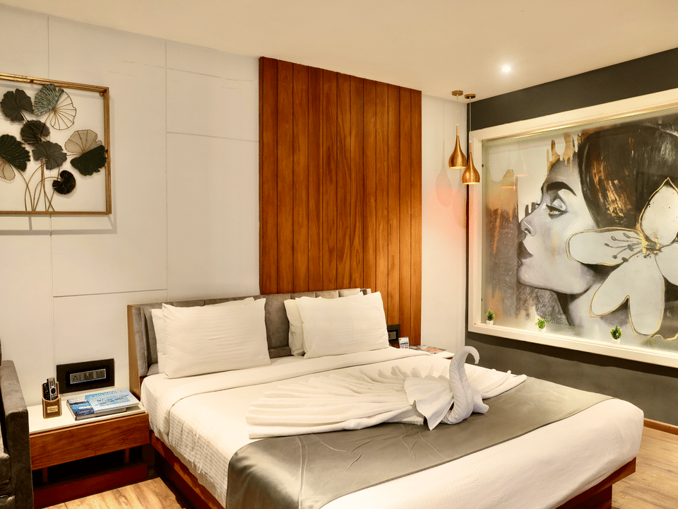 Premier Room, Bed against the wood-panelled wall