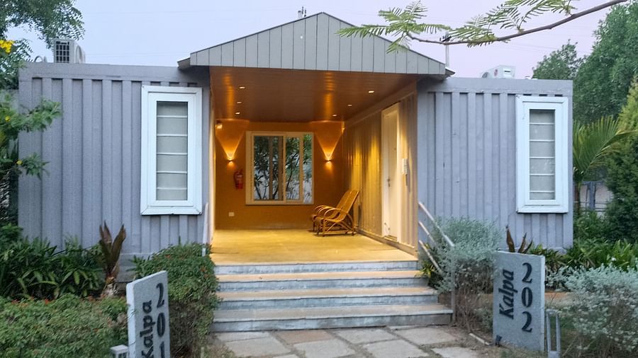 A facade image of the Kalpa cottage with greenery around - Trance Veechika Resort