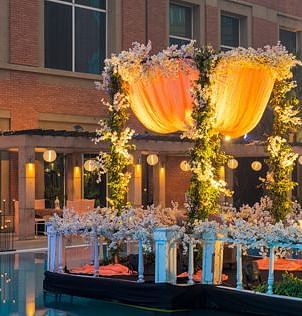 A poolside venue with lavish decoration at evening at Nirvana Luxury Hotel, Ludhiana.