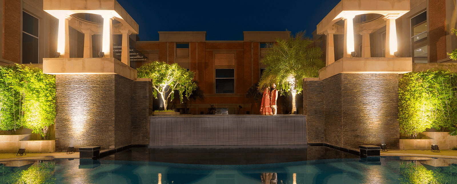 A computer render of a building besides a pool at Nirvana Luxury Hotel, Ludhiana