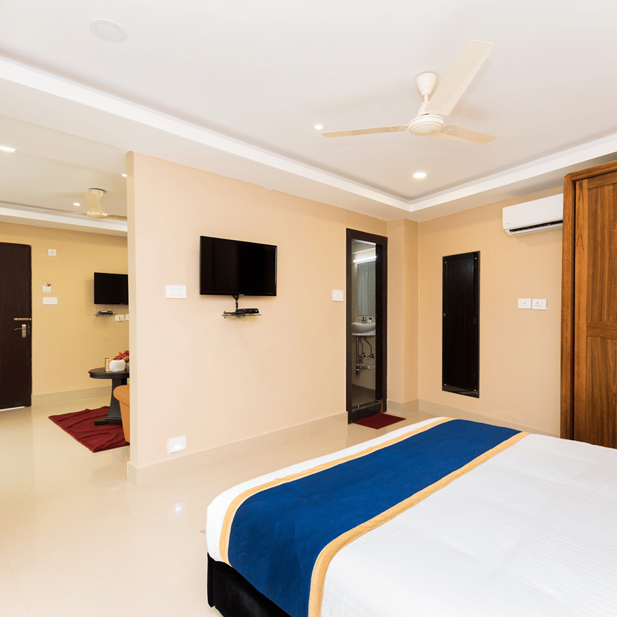 Bedroom of the Suite opening to the sitting room at Central Courtyard Boutique Hotel, Siliguri