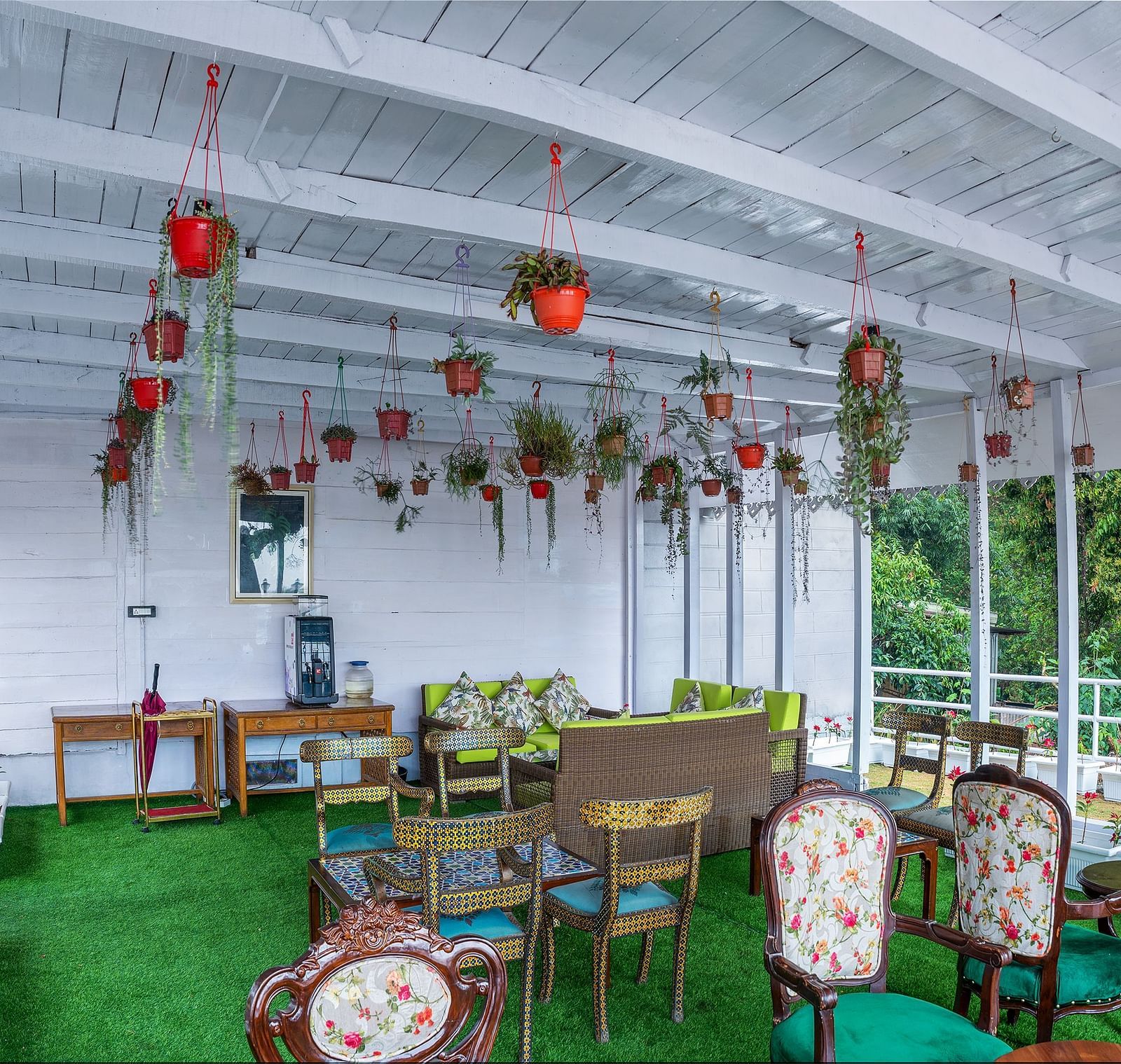 Open-air restaurant seating arrangement at Summit Barsana Resort & Spa, Kalimpong
