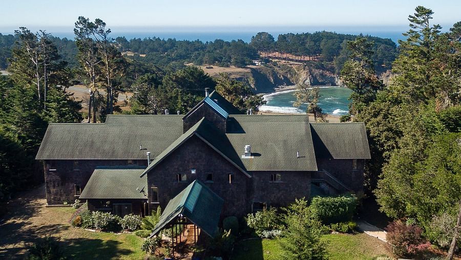 A breathtaking aerial view of a hotel near the Mendocino coast - Brewery Gulch Inn & Spa