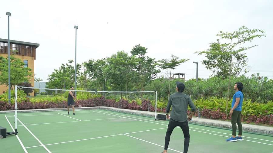 People playing badminton at Singalila Club