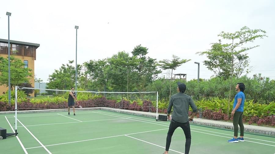 People playing badminton at Singalila Club
