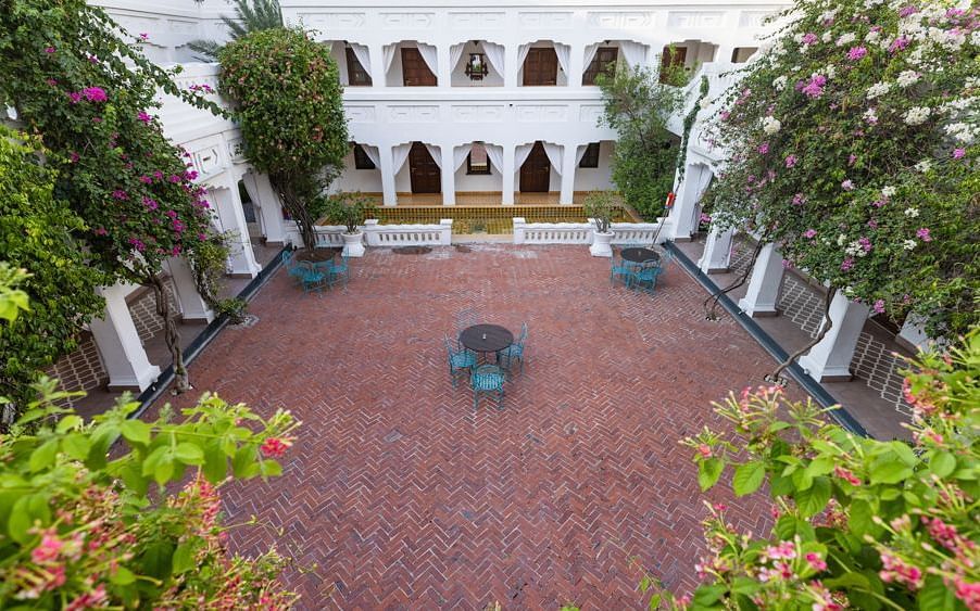 A view from the top of Saraca Hotel Lucknow of the hall Sehen with the courtyard in view
