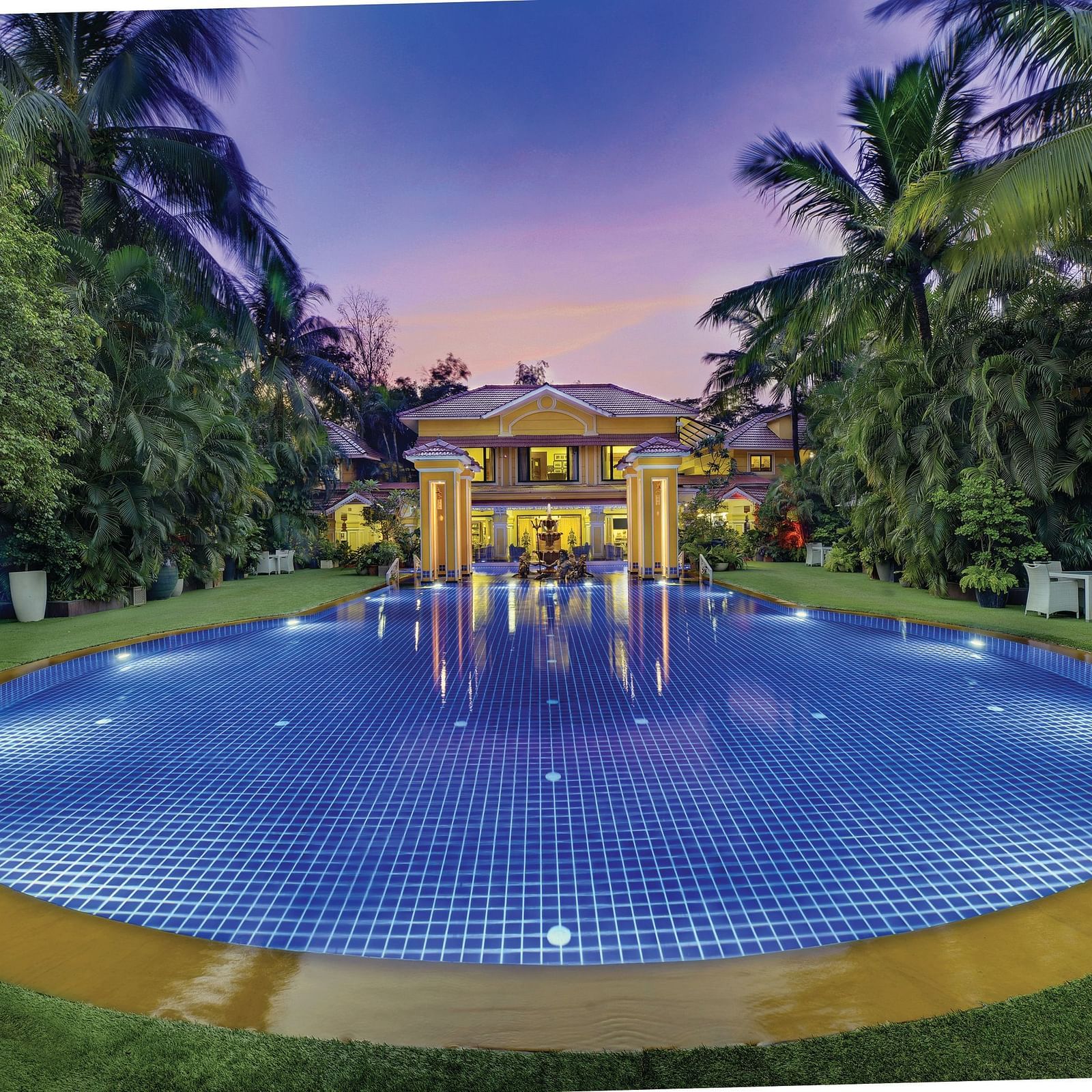 view of the swimming pool and the property behind it - Mayfair Lagoon, Bhubaneswar