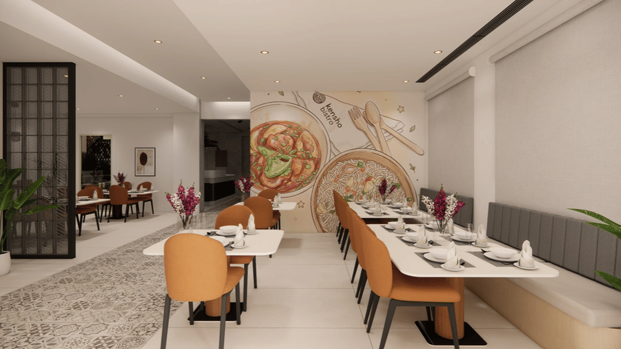 Tables, chairs, and bench seating area at Kensho Bistro in Hotel Kyzen Shamshabad.