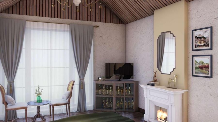 Cosy room with a vaulted wooden ceiling, a classic fireplace, and dark curtains framing the window at BluSalzz Terrah Hills Resort, Dalhousie.