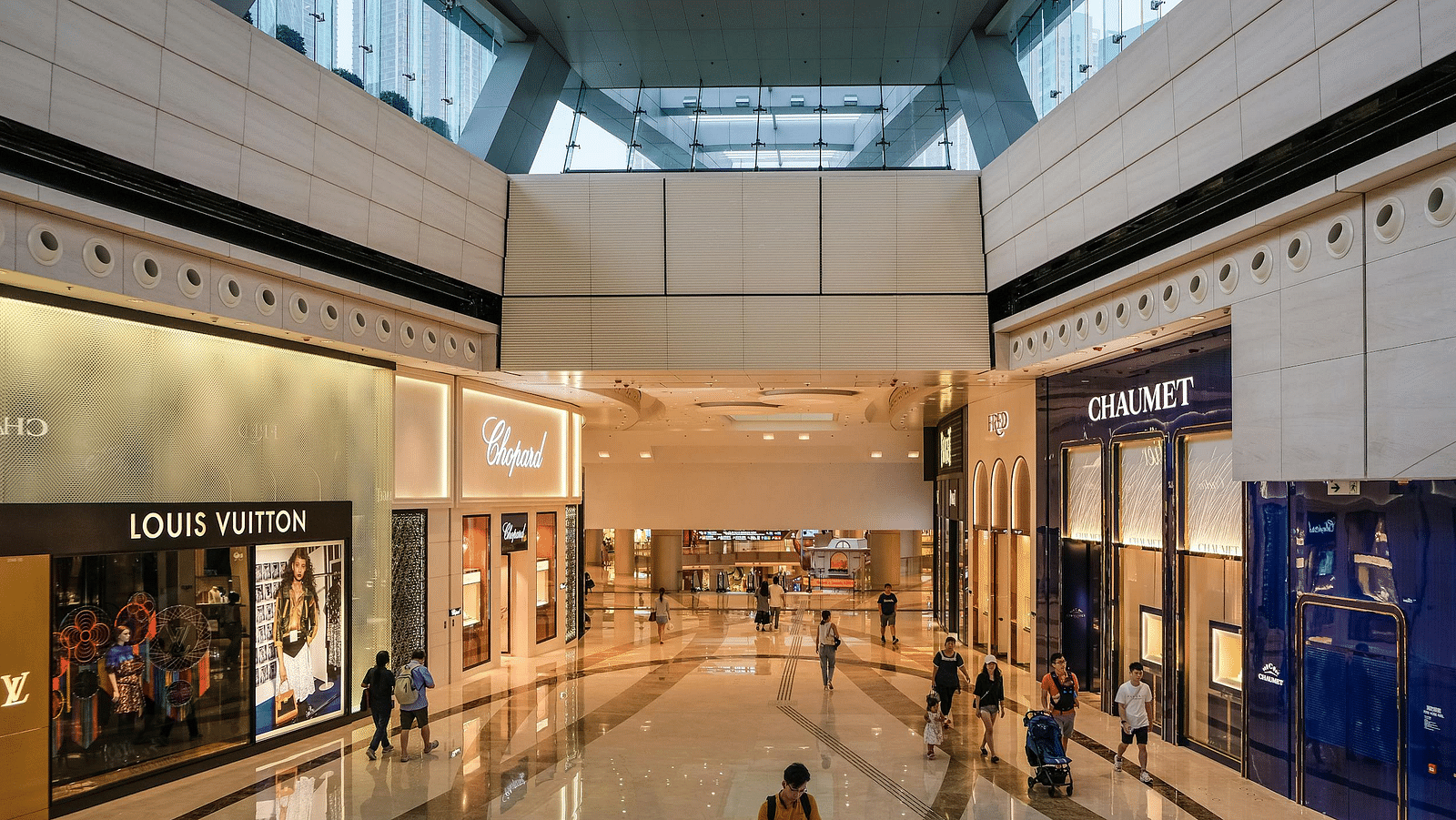 Image of a mall with international  brand shops.