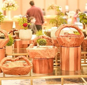 A table with various baskets placed in an order at Nirvana Luxury Hotel, Ludhiana.