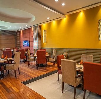 Dining of a restaurant at Kona Lounge at Nirvana Luxury Hotel, Ludhiana.