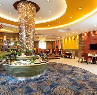 Dining of a restaurant with lavish interiors at Kona Lounge at Nirvana Luxury Hotel, Ludhiana.