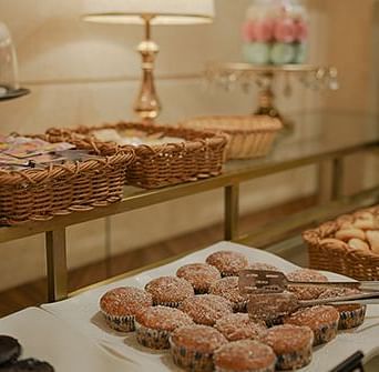 A close-up shot of pastries placed on a buffet counter at Nirvana Luxury Hotel, Ludhiana.