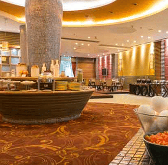 Interiors of a restaurant at Nirvana Luxury Hotel, Ludhiana