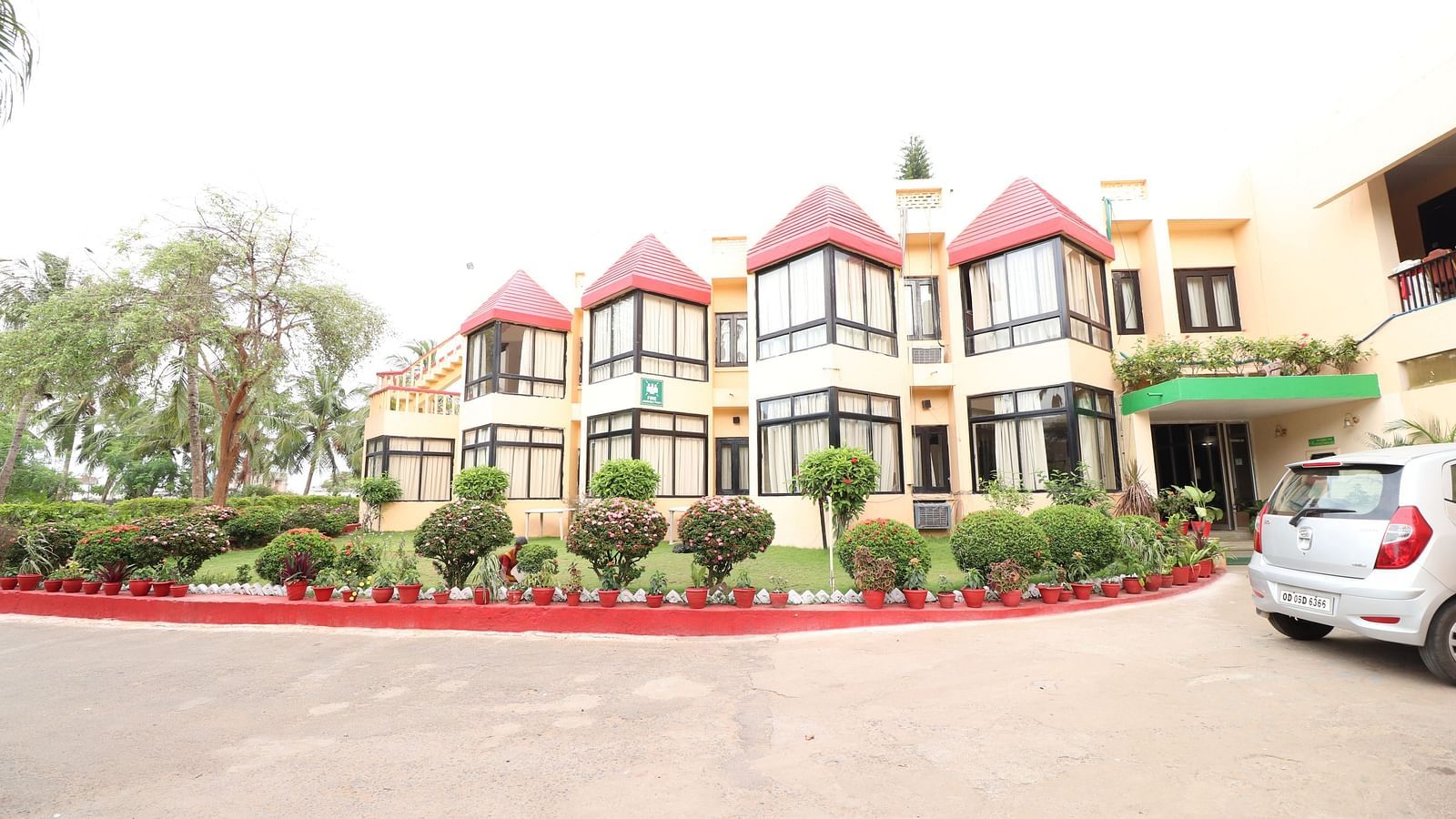 Front view of the Gopalpur Palm Resort facade