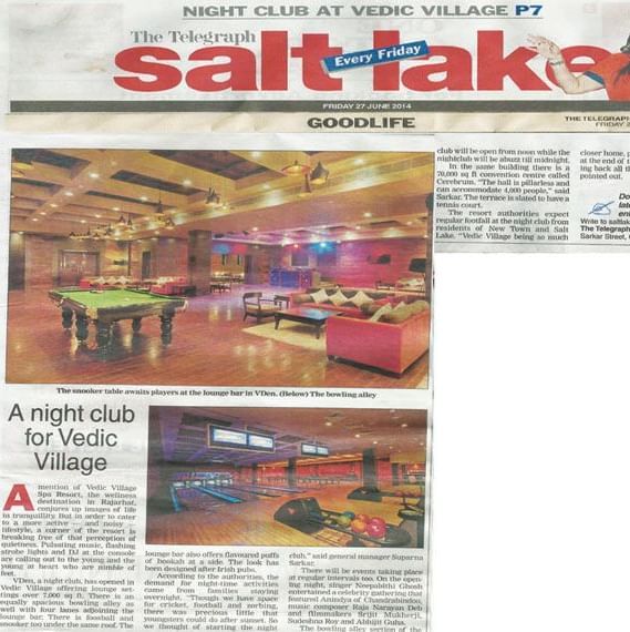 A newspaper page titled Salt-tak showcasing images and an article about a night club at Vedic Village Spa Resort.