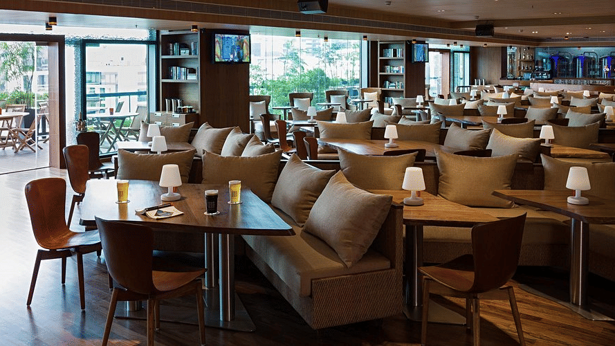 Indoor restaurant dining room with a contemporary, warm ambiance.