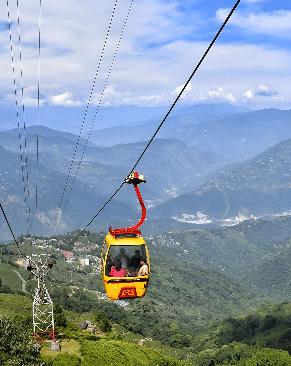 Cable car on the ropeway offering a view of the vast stretches of hilly landscape in Darjeeling.