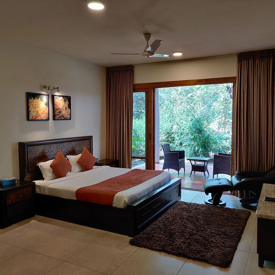 The Birchwood Retreat - bedroom with the view of the garden. 