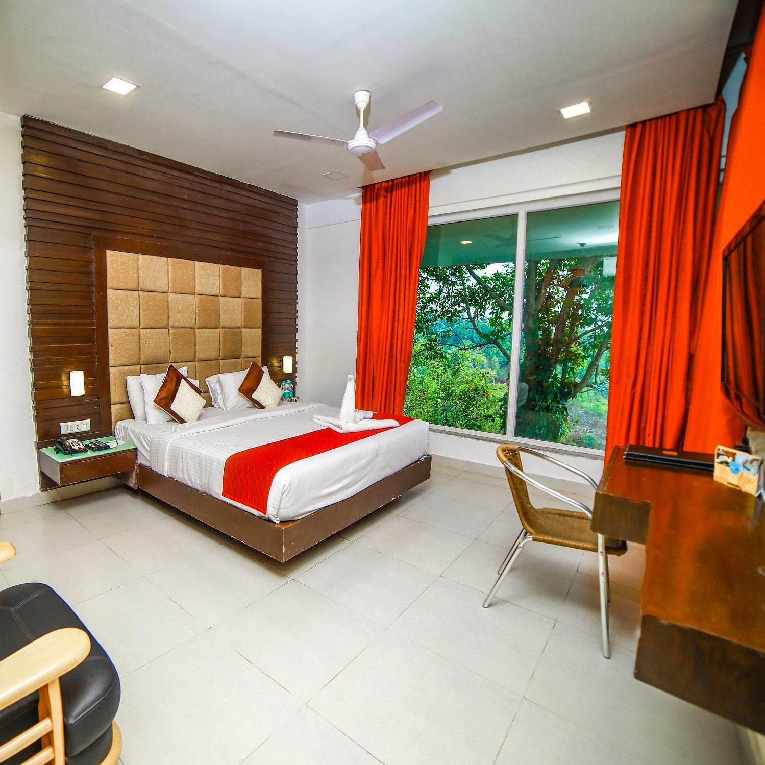 Wide view of the bed in the Artist Suite at Grand Palace, Yercaud