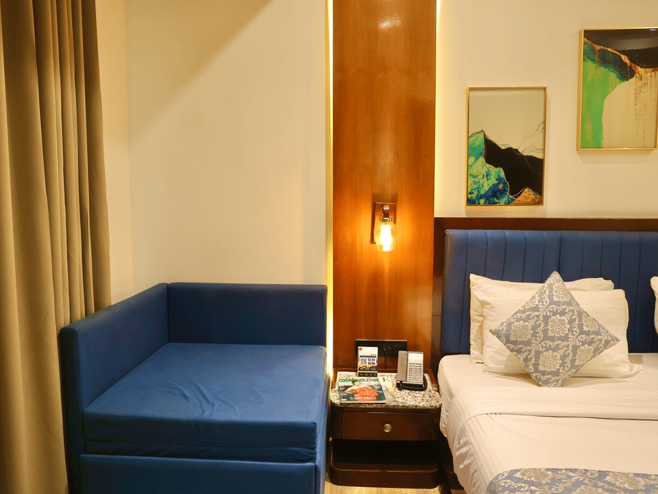 Skyline by Miraya, Classic Room, Lounge sofa beside the king bed
