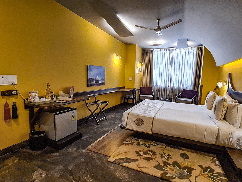 A bedroom at Ekaa Villa & Kitchen with a double bed - 2