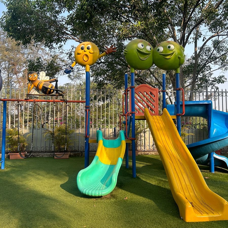 Colourful children’s play area, equipped with slides and fun climbing structures – Maxxvalue Klub Klass Villa, Lonavala.