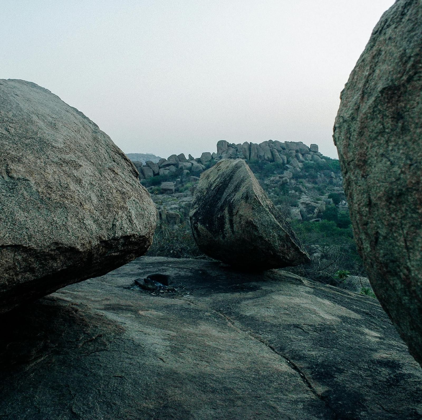 Boulders lying in an open area.