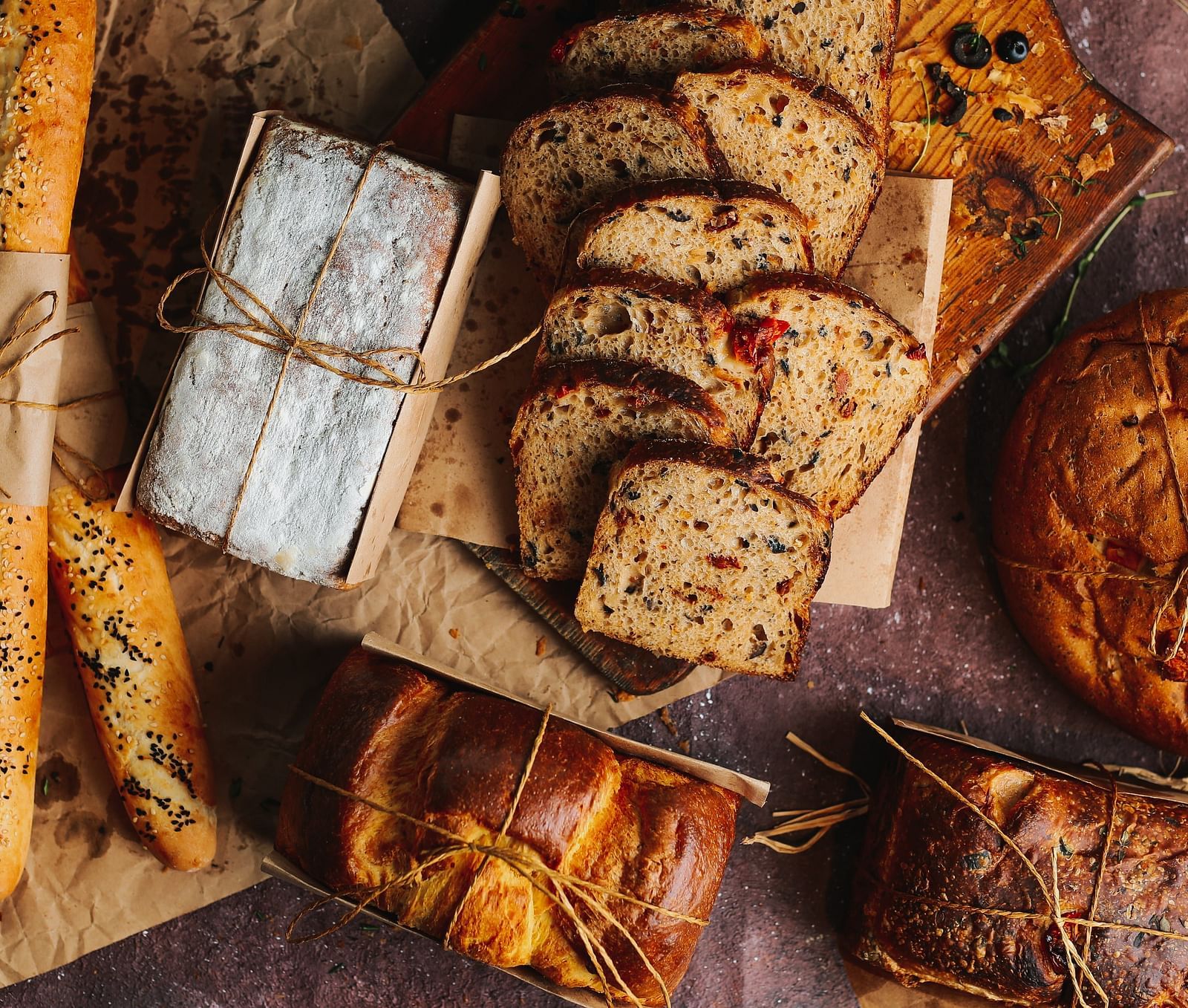 Freshly baked bread on a board.